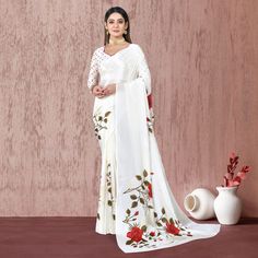 White colored saree is prettified with beautiful floral foil printed work as shown which makes it appear classy. This saree is made of chiffon silk fabric which is accompanied with chiffon blouse piece which you can customise as per your design/style. Women can buy this saree to wear for their parties and functions. Note:- The actual product may differ slightly in color and design from the one illustrated in the images when compared with computer or mobile screen. Measurements: Saree : Chiffon : 5.5 Mtrs Blouse : Chiffon : 0.8 Mtr Material: Chiffon Stitch Type: Unstitched Country of Origin: India Care Guide: Dry Clean Printed Chiffon Saree, Saree Chiffon, Blouse Chiffon, Mobile Screen, Chiffon Saree, Chiffon Blouse, Style Women, Print Chiffon, Foil Print