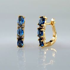 Brand New Women's Sapphire & Diamond Latch Back Earrings 14k Gold Plated Sterling Silver 2ct Natural Blue Sapphire Gemstones Genuine 1ct Lab Created Radiant Cut Diamonds Measurements .6" Tall X .4" Wide Retail Price $300 Buy With Confidence From A Trusted Seller W/ A 99%+ Feedback Rating! A0263 (Id-1013-) Blue Fine Jewelry Huggie Earrings For Gift, Blue Fine Jewelry Huggie Earrings As Gift, Blue Huggie Earrings Fine Jewelry Gift, Elegant Blue 14k Gold Huggie Earrings, Blue Huggie Earrings For Anniversary, Blue Gemstone Huggie Earrings, Elegant Blue Round Huggie Earrings, Elegant Sapphire Huggie Earrings, Elegant Blue Gemstone Huggie Earrings