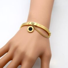 The Round Tag Bangle Bracelet for Women is a combination of fashion and health Showcase your style and personality as you complete your favorite outfit with this beautiful charm bracelet. In its seemly simple form, it will add elegance, sophistication, and eye-catching allure to your formal or casual outfit. This stunning bracelet available in silver, gold, or rose gold will emphasize your fun and charming style in a majestic way. It's clearly the time to Take Your Style To The Next Level. Don't Luxury Gold Round Bracelet For Festive Occasions, Elegant Bangle Bracelets For Friendship, Elegant Bangle Bracelet For Friendship, Elegant Bracelet For Friendship, Minimalist Stainless Steel Charm Bracelet, Minimalist Alloy Bangle Bracelets, Elegant Charm Bracelet With Bracelet Strap For Friendship, Elegant Charm Bracelet With Bracelet Strap, Elegant Charm Bracelet For Friendship