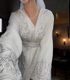 White Luxury Embroidered Wedding Dress - Bridal Gown with Intricate Details, Romantic Elegance, Handcrafted Beauty, Timeless Chic Floral Embroidered V-neck Wedding Gown, Elegant White Wedding Dress For Ceremony, Traditional V-neck Wedding Gown, Floor-length Embroidered Wedding Dress, White Pearl Embroidered Dress For Ceremony, White Ceremony Dress With Pearl Embroidery, White Dress With Pearl Embroidery For Ceremony, Long Sleeve Dresses With Intricate Embroidery For Wedding, Elegant White Gown For Mother Of The Bride