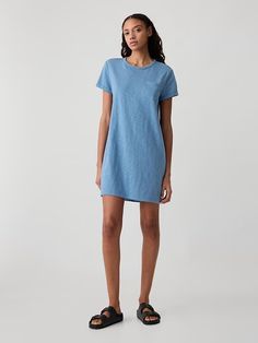 Pocket T-Shirt Dress | Gap Factory Casual Cotton T-shirt Dress With Relaxed Fit, Casual Dresses With Curved Hem For Daywear, Casual Loungewear Dress With Curved Hem, Casual Crew Neck Loungewear Dress, Casual T-shirt Dress For Loungewear, Crew Neck Cotton Lounge Dresses, Casual Crew Neck T-shirt Dress For Daywear, Summer Crew Neck Dresses With Side Pockets, Relaxed Fit Crew Neck Everyday Dress