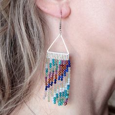 The perfect combination of elegant and fierce! These gorgeous fringe earring kits, designed by Jacquelyn, include 3 sparkly 15 inch strands of 2mm faceted gemstones from Dakota Stones in each kit. The metal triangle frames are the perfect base for these fringe earring designs that are so on trend, yet also timeless. Once completed, these earrings will measure approximately 3.75" long. Kit includes all materials for these earrings along with step-by-step instructions. Tools needed to complete thi Dangle Beaded Earrings With Gemstone Beads For Jewelry Making, Gemstone Beaded Dangle Earrings For Jewelry Making, Gemstone Beads Dangle Earrings For Jewelry Making, Sterling Silver Dangle Earrings With Faceted Beads, Seed Bead Fringe Earrings, Bead Fringe Earrings, Fringe Earring, Chain Nose Pliers, Bead Fringe