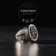 Crafted with an artful touch, the "Timeless Wisdom Oval Signet Ring" is a sophisticated piece that encapsulates the essence of resilience and the enduring human spirit. Embracing the intricate art of engraving, this ring boasts a central motif adorned with the uplifting inscription 'buda geçer yahu', a Turkish adage meaning 'this too shall pass' - a timeless reminder that all experiences, good and bad, are fleeting. The sides of the ring are embellished with fine micro gemstones, adding a touch Luxury Oval Engraved Ring With Engraving Option, Classic Handmade Engraved Ring For Ceremonial Use, Classic Handmade Engraved Ring For Ceremonial Occasions, Symbolic Oval Etched Rings, Luxury Oval Signet Ring With Intricate Design, Luxury Carved Oval Signet Ring, Traditional Oval Engraved Anniversary Ring, Timeless Oval Rings For Ceremonial Occasions, Symbolic Oval Engraved Ring For Ceremonial Occasions