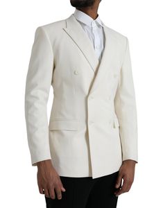 This Dolce & Gabbana blazer features a double-breasted design with two buttons. It comes in white with Martini style and slim fit. Made in Italy from 98% virgin wool and 2% elastane, it has a 100% silk lining and one open vent in the back. It also includes inside pockets and a two button closure. Style Blazer, Dolce And Gabbana Man, Breasted Blazer, Double Breasted Blazer, Blazer Buttons, Dolce & Gabbana, Martini, Men's Blazer, Double Breasted