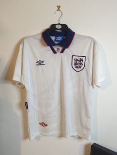 an england shirt hanging on the wall