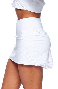 Color: Cloud White Description: The Cute As A Bunny Skirt is the perfect blend of fun and functionality with just the right amount of girlie! High-waisted and court-ready with an a-line silhouette and layers of flirty mesh at the back to finish. A comfy inner short and lightweight feel make this one a must-have for tennis season and beyond. Comfy inner short Designed & uniquely fit to flatter every size Layers of flirty mesh in back FIT True to size A-line silhouette and high waisted Model is 5’ Tennis Season, Color Cloud, Athletic Skirt, Cloud White, A Bunny, Designer Shorts, Small Light, Tennis Skirt, Performance Fabric