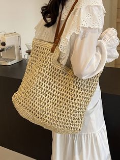 In Stock Fast Shipping From Los Angeles This tote bag will have you feelin' like a jetsetter! The Elena Handbags Straw Woven Tote Bag is a timeless piece to add a touch of elegance to your everyday style. Featuring a simple straw woven design, the bag is versatile enough to carry your everyday essentials, no matter the 'occasion(al situation)! Magnetic button closureDimensions: 12.5"H x 15"WStrap drop length: 11 inches Designer Style ID: 8656 Straw Woven Tote Bag, Retro Vibes, Summer Bag, Everyday Shoulder Bag, Beach Bag Neutral Tote Bag, Elegant Summer Bags, Summer Bag, Woven Tote Bag, Straw Bags, Raffia Bag, Boho Bags, Trending Handbag, Jute Bags