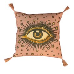 a decorative pillow with an eye on it