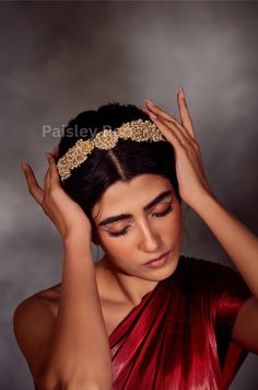 The gold-plated Kundan headband is an ode to the Indian tradition and the intricate work handcrafted by artisans. The pearl hairband will be a complement to the bridal accessory that blends Indian jewelry in traditional aesthetics with modernity. Kundan and Pearls are match-made in heaven, the bold yet delicate design of the Kundan sheeshpatti is perfect for the woman of today who believes in paying tribute to ancestral values with splendid glitz and glam.  Closure: Hook Style Tip - An versatile accessory, we are sure to see it in an amalgam of colors, textures, fabrics, and personalities all unique. Team this with your choicest of Indo western dresses and watch the heads turn. Handcrafted in Jammu and Kashmir. Paisley Pop travels the depths of India to learn techniques and crafts from dee Traditional Gold Hair Accessories For Wedding, Traditional Gold Wedding Hair Accessories, Traditional Gold Hair Accessories For Festive Occasions, Gold Kundan Bridal Accessories For Celebration, Elegant Gold Tikka With Zari Work, Gold Temple Jewelry Bridal Accessories, Gold Bridal Accessories For Festive Celebrations, Elegant Gold Tikka With Gota Work, Gold Crown Headpiece For Festivals