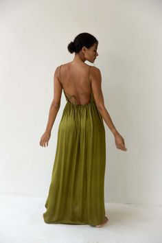 Bahhgoose Rio Dress - Pistachio | Garmentory Chic Maxi Dress With Ruched Back For Brunch, Chic Brunch Maxi Dress With Ruched Back, Elegant Backless Dress With Smocked Back For Vacation, Green Backless Slip Dress For Summer, Chic Maxi Dress With Ruched Back For Vacation, Spring Evening Maxi Dress With Strappy Back, Chic Maxi Slip Dress With Ruched Back, Chic Maxi Length Slip Dress With Ruched Back, Chic Spaghetti Strap Maxi Dress With Tie Back