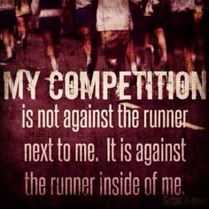 a group of people running down a road with a quote about competition on the side