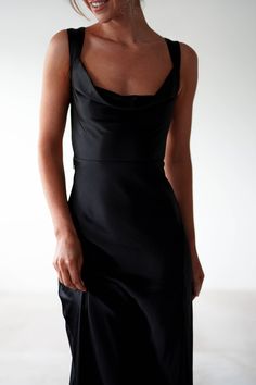 Riviera Soft Satin Maxi Gown | Black Black Dress Classy Aesthetic, Hairstyles For Necklines Dresses, All Black Wedding Guest Attire, Dresses For Wide Shoulders, Black Dress Dance, Black Tie Optional Wedding Guest Dress, Dresses For Prom Night, Cowl Neckline Dress, Black Satin Gown