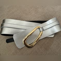 Beautiful Wrap Belt. Length 33 Inches. 3 Inch Wide. Best Fits A Size 4-8 Waist. Silver Leather. Never Worn. Elegant Leather Belt With Silver Buckle, Silver Leather Belt With Logo Plaque, Silver Leather Belt With Buckle Closure, Summer Belt, Double Buckle Belt, Luxury Leather Belt With Silver-tone Hardware, Zara Gold, Black Leather Belt With Silver-tone Logo Plaque, Belt Length