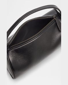 "Find THE ROW Baguette on Editorialist. The THE ROW Baguette is crafted from napa leather and features a top handle, zip top closure, and measures approximately 5.1\"H x 7.9\"W x 3.9\"D. This baguette is made in Italy." Timeless Leather Baguette Bag With Detachable Handle, Evening Satchel Baguette Bag With Zipper Closure, Luxury Top Handle Baguette Bag With Zipper Closure, Luxury Baguette Bag With Zipper Closure And Top Handle, Luxury Baguette Bag With Zipper And Top Handle, Luxury Everyday Baguette Bag With Zipper Closure, Luxury Baguette Bag With Zipper For Daily Use, Elegant Business Baguette Bag With Zipper Closure, Evening Rectangular Baguette Bag With Zipper Closure