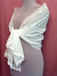 "A chic white wedding cape made of high-quality, slightly elastic fabric. The shrugs shawl is embroidered with silk threads and the hem ends in macramé lace. Bolero, a shawl covering the shoulders of the bride. Scarf measures 58\" x 20\" (150cm x 50cm). Due to the delicate nature of the product, the scarf is a final sale and non-returnable, but if you have any questions, please contact me, I will definitely resolve the issues." Elegant Lace Trim Veil For Ceremony, Lace Shawl With Lace Trim For Wedding, Crochet Lace Shawl For Wedding, Wedding Lace Shawl With Lace Trim, Elegant Embroidered Wedding Shawl, Wedding Lace Shawl Dupatta, Wedding Lace Dupatta Shawl, Lace Dupatta Shawl For Wedding, Lace Dupatta With Lace Trim