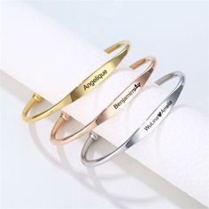 ✦Elevate your gifting game with our Custom Name Engraved Birthstone Bangle Bracelet. Each one is lovingly handcrafted with a personal name and dainty birthstone, symbolizing the bonds of friendship and celebration. Made of durable stainless steel, it's a stylish statement piece that can be worn every day and adjusted for the perfect fit. Give the gift of meaningful luxury. ----------- DETAILS ---------- - Adjustable Bangle Cuff Bracelet - Color: Gold/ Silver/ Rose Gold - Buying Options: 1 Birthstone with Name - Bracelet Diameter: 60mm - Bracelet Width: 3mm - Materials: 316L Stainless Steel, Gold Plated *316L Stainless Steel is hypoallergenic, generally safe for sensitive skin. - SKU: B003