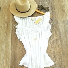 Rare, Brand New W/Tags, M.K. Michael Kors Logo Blouse Top, Shirt Size: Large Color: White Measurements: See Pics 9-11 Fabric: 57% Cotton, 42% Polyester, 1% Elastane Features: Beautiful Ruffle-Flutter Sleeves, Flowy, Gold Hardware, Textured Perfect Addition To Your Summer Wardrobe, Vacay, Resort, Lounge, Beech Shopping Or Dress It Up For Date Night! Please No Trades No Refunds Smoke Free/Pet Free Home Ships Next Day Please Ask All Questions Before Purchasing. Thank You For Stopping By! ***Hat/Sun White Ruffle Sleeve Top For The Beach, Fitted Summer Tops With Ruffle Sleeves, White Ruffle Sleeve Top For Beach, Fitted Ruffle Sleeve Summer Tops, White Ruffle Sleeve Blouse For The Beach, Summer Vacation Tops With Ruffle Sleeves, White Ruffle Sleeve Tops For Vacation, Chic Ruffle Sleeve Tops For Beach, Chic Ruffle Sleeve Beach Tops