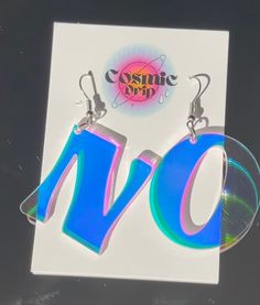 Let your earrings speak for you so you can conserve your energy. We all need to say "NO" sometimes! - Made with stunning iridescent acrylic!- Earrings coloring changes depending on how light is hitting them (see all pictures)- Earring hooks are stainless steel, nickel-free, and hypoallergenic- Rubber backing included