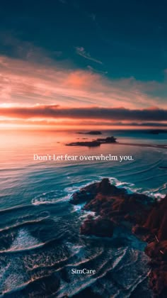 the ocean with an inspirational quote on it that says don't let fear overwhelm you