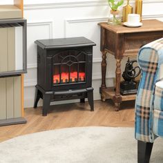 a living room with a chair and a fire place in the corner on the floor