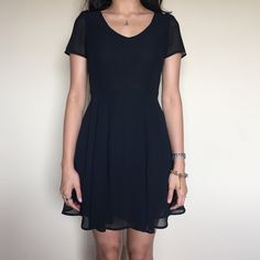 🎉HP 11/22🎉 Cotton On Little Black Chiffon Dress Black. Chiffon dress with v-neckline, short sleeves and a flowy skirt. 100% polyester. New with tags. Cotton On Dresses Chiffon Dress Black, Black Chiffon Dress, Black Chiffon, Moving Sale, Flowy Skirt, Cotton On, Chiffon Dress, Dress Black, Colorful Dresses