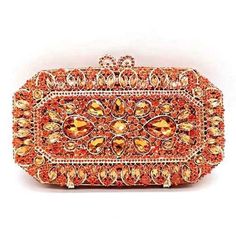 This Gorgeous Metal Clutch Is Beautifully Decorated By Our Talented Artisans With Hundreds Of Hand Set Orange Sparkling Austrian Crystals. An Elegant Evening Bag For A Wedding, Night Out On The Town Or Any Formal Event. Removable Chain Strap. Magnetic Closure. Metallic Faux Leather Lining. Accommodates All Iphone Models Or Similar Size Phones With Maximum Dimensions Of 160 Mm X 78 Mm. Approx. 8.25" L X 4.75" H X 2.5" W. Color For Sale In This Listing Is Orange. Video Shows The Purse In Champagne Elegant Orange Clutch For Party, Orange Rectangular Formal Clutch, Orange Rectangular Clutch For Formal Occasions, Elegant Orange Bag, Elegant Orange Rectangular Evening Bag, Elegant Orange Clutch As A Gift, Elegant Orange Rectangular Clutch, Elegant Orange Bag Gift, Elegant Orange Clutch Bag