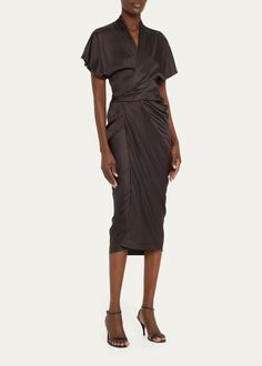 Rick Owens Short-Sleeve Wrap Midi Dress - Bergdorf Goodman Short Sleeve Midi Dress With Ruched Bodice For Evening, Knee-length Midi Dress With Gathered Sleeves For Evening, Evening Midi Dress With Gathered Sleeves, Knee-length Silk Midi Dress With Pleated Sleeves, Silk Dress With Draped Sleeves, Cocktail Knee-length Ruched Satin Dress, Formal Short Sleeve Midi Dress With Ruched Bodice, Knee-length Midi Dress With Gathered Sleeves For Cocktail, Satin Ruched Midi Dress For Dinner