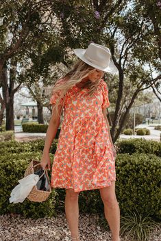 Cute Spring Tiered Dress, Cute Tiered Dress For Spring Garden Party, Cute Spring Tiered Dress For Garden Party, Spring Vacation Tiered Dress With Square Neck, Cute Summer Tiered Dress For Garden Party, Casual Orange Puff Sleeve Dress, Orange Floral Dress For Brunch, Orange Tiered Skirt Dress For Spring, Spring Floral Print Tiered Dress