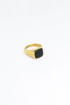 The boldest of them all the Onyx Ring. Whether solo or stacked everyone will see you. Materials: 14k-Gold Filled Stainless Steel, Black Onyx Details: US size 6 & 7﻿, Classic Black Stackable Jewelry, Everyday Black Signet Ring With Polished Finish, Modern Gold Onyx Jewelry, Gold Onyx Ring As A Gift, Gold Onyx Ring Perfect As A Gift, Gold Onyx Ring Perfect For Gifts, Classic Everyday Jewelry With Black Enamel, Black Everyday Ring Jewelry, Black Stackable Jewelry For Formal Occasions