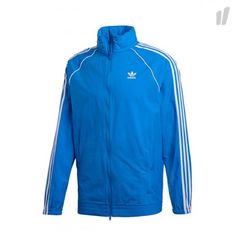 Brand New With Tags Adidas Superstar Windbreaker Jacket Size M Authentic. Adidas Blue Track Jacket For Streetwear, Blue Three Stripes Track Jacket For Fall, Blue Streetwear Outerwear With Three Stripes, Blue Stripe Outerwear For Streetwear, Blue Sportswear Windbreaker For Spring, Blue Track Jacket For Winter Outdoor Activities, Adidas Blue Track Jacket With Three Stripes, Casual Blue Track Jacket For Streetwear, Adidas Long Sleeve Outerwear With Three Stripes