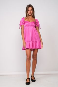 You're sure to wow them in the Addison Pink Puff-Sleeve Mini Dress! Pink satin fabric forms a puff-sleeve babydoll mini dress with ruffle hem. Style with cute heels for a fun dressed-up look! DETAILS & FIT Relaxed Fit. Polyester. For best results dry clean. Imported. Flirty Dresses With Gathered Short Sleeves, Flirty Short Sleeve Dress With Gathered Sleeves, Short Sleeve Dress With Gathered Sleeves, Pink Satin Fabric, Dress With Ruffle Hem, Mini Dress Pink, Babydoll Mini Dress, Boho Pink, Cute Heels