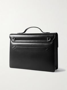 Designed to celebrate Montblanc's centenary, this 'Meisterstück' briefcase is crafted from sleek black leather and can be carried by the top handle or adjustable shoulder strap. It has a roomy interior with space for a 13'' laptop and a dedicated front pocket that nods to vintage pen pouches. High-end Black Briefcase With Top Handle, High-end Black Top Handle Briefcase, High-end Black Briefcase With Detachable Strap, High-end Black Briefcase With Detachable Handle, High-end Satchel Briefcase For Business, High-end Business Satchel Briefcase, Designer Office Briefcase With Detachable Handle, High-end Briefcase With Top Carry Handle For Office, High-end Office Briefcase With Top Carry Handle