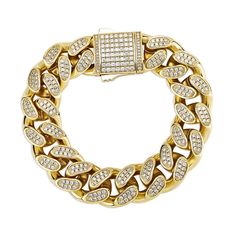 Put some Cuban flavor into your style with this 18mm Cuban link bracelet. It's crafted with high quality gold plating and adorned with cubic zirconia stones for a touch of luxury. The Cuban link design is classic and stylish, and it's sure to make a statement whether you're dressing up or dressing down.This bracelet is the perfect way to add a little bit of edge to your outfit. Whether you're going for a night out on the town or just hanging out with friends, this bracelet will help you make a s Iced Out Gold Chain Link Bracelet, Gold Cuban Link Tennis Bracelet With Diamond Accents, Gold Tennis Bracelet With Diamond Accents And Cuban Link, Gold Crystal Chain Bracelet With Bling, Gold Chain Bracelet With Diamond Accents And Cubic Zirconia, Gold Cuban Link Diamond Bracelet Iced Out, Gold Diamond Chain Bracelet With Rhinestones, Gold Tennis Bracelet With Cubic Zirconia Chain, Gold Cuban Link Bracelet With Bling