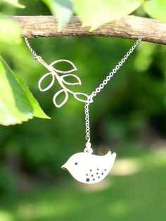 Bird and Branch Necklace - Best Friends Gift, Modern, Simple, Everyday Jewelry This pretty necklace features a silver plated twig with open leaves and a cute little sparrow.  Great necklace for everyday wear as well as special occasions! 17 inches length Branch - Material: brass + M.Silver-plated (Rhodium plated, TARNISH resistant) Size: approx 18 * 39mm  Bird -Matte Silver tarnish resistant Chick Bird Charms Material: brass+ matte rhodium plating Size: 17 mm * 12mm  Conversion: 1 inch = 25.4mm Silver Sterling Silver Lariat Necklace As Gift, Silver Lariat Necklace With Adjustable Chain As Gift, Delicate Silver Lariat Necklace As Gift, Delicate Silver Lariat Necklace For Gift, Silver Charm Necklaces With Adjustable Chain For Weddings, Wedding Charm Necklace With Adjustable Sterling Silver Chain, Delicate Silver Charm Necklaces For Jewelry Making, Wedding Silver Clavicle Chain Charm Necklace, Dainty Silver Chain Necklace For Wedding