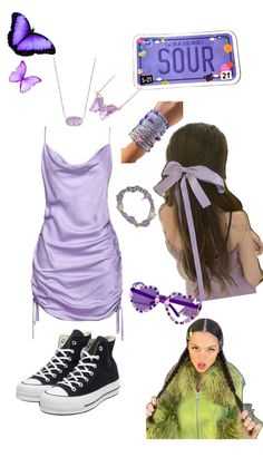 a woman wearing purple clothes and accessories