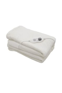 a white blanket with an electric heating pad on top and thermometer attached to it