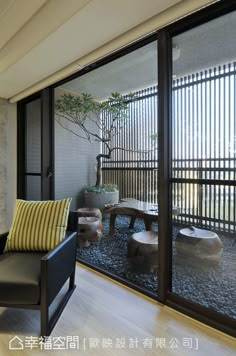 a living room with sliding glass doors leading outside