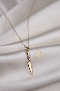 "ABOUT PRODUCT This 14K Gold Knife Necklace is beautifully designed and hand crafted with our associates to make this a special gift for your loved ones. Knowing the value of our customers, We prepare each piece with extra care and attention. ITEM DETAILS Material: 14K Gold Approx: 2,70 gram   Only Pendat: 1,80 gram Available colors: Gold, Rose Gold, White Gold Available Sizes: 14\" to 20\" ✪ 14k Solid Gold ( Certification will be included with your order ) ✪Available 14K White, Yellow, Rose Gol Artisan Yellow Gold Jewelry Gift, Handmade Fine Jewelry Necklaces For Gifts, Handmade Fine Jewelry Necklace Gift, Dainty Handmade Necklace For Formal Occasions, Handmade 14k Gold Pendant Necklace, 14k Gold Jewelry As Gift, 16 Inch Length, Luxury Handmade Custom Necklace For Gift, Minimalist 16-inch Jewelry As A Gift, Luxury Handmade 14k Gold Necklaces