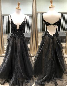 Formal Backless Evening Dress With Lace Bodice, Black Sleeveless Ball Gown For Party, Sleeveless Black Ball Gown For Party, Prom Evening Dress With Lace Back, Backless Prom Dress With Lace Bodice, Black Evening Gown With Corset Back, Black Ball Gown With Fitted Bodice For Party, Prom Evening Dress With Sheer Back In Tulle, Black Low Back Gala Dress