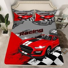 a bed with a red sports car on it