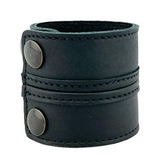 PRICES MAY VARY. HIGH QUALITY MATERIALS: Full-grain beautifully rugged leathers and the strongest industrial grade threads. All newer versions now have upgraded metal snaps, rust-free and extremely durable. PERSONALITY: Our leather burnishes and beautifies with use. These leather cuff bracelets have a stylish, hardy, rugged design sure to please any leather aficionado. The leather is full grain with original marks and scars. Each piece is special in its own way, and can vary some batch to batch Adjustable Leather Wristband With Waxed Finish, Classic Adjustable Leather Bracelet With Waxed Finish, Classic Adjustable Leather Bracelet With Wrist Strap, Masculine Adjustable Leather Bracelet, Masculine Adjustable Leather Bracelet For Everyday, Classic Adjustable Leather Wristband, Adjustable Classic Leather Wristband, Adjustable Rugged Leather Bracelet, Rugged Adjustable Cuff Leather Bracelet