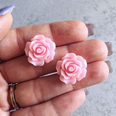 "These beautifully detailed stud earrings feature resin rose cabochons set onto stainless steel stud posts. The roses measure 3/4\" (20mm) across. The stainless steel posts are hypoallergenic for sensitive ears (as well as lead and nickel-free) and will include a pair of safety backs for comfort and security. This listing is for *ONE* pair of earrings. You may select your preferred color from the drop-down list prior to checkout: ▻ Light Pink ▻ Hot Pink These would be perfect for bridesmaids gif Rose Jewelry With 3d Flowers For Gift, Pink Rose Flower Earrings For Gift, Pink Cabochon Earrings For Gift, Pink Cabochon Earrings As Gift, Resin Rose, Hot Pink Roses, Rose Stud Earrings, Floral Bridesmaid, Bronze Ring