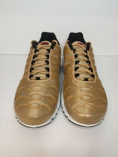 Nike Gold Sneakers For Streetwear, Nike Gold Sneakers With Boost Midsole, Nike Gold High-top Sneakers, Sporty Gold Sneakers For Streetwear, Nike Gold Sporty Sneakers, Gold Sneakers For Streetwear With Round Toe, Gold Sneakers With Midsole For Streetwear, Gold High-top Sporty Sneakers, Nike Gold High-top Custom Sneakers