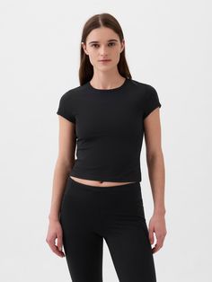 Supersoft ribbed knit cropped baby T-shirt.  Crewneck.  Short sleeves.  * Fit: Slightly fitted.  Sits close to the body.  Cropped, hits at the waist.  Models wearing Gap Gap Fit, Cropped T Shirt, Baby T Shirt, Knit Crop, Crop Tshirt, Petite Size, Baby Tshirts, Next Generation, New Black