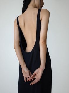 A maxi length Tencel Spandex blend sleeveless dress. Stunning backless design with scoop detail. Model is in MINUSEY ONE SIZE. ✔️ Free worldwide express shipping over $100✔️ Loved by 6,500+ customers✔️ Limited edition collections, maximum styleStay ahead of the trend with can’t-find-anywhere-else staples. Your closet will thank you 💕 * MINUSEY ONE SIZE = EU 34-38, US 2-6* 96% Tencel / 4% Spandex* Dry clean* Made in Korea - Model Height: 172cm/5'7" (US2, EU34) Stretch Maxi Dress With Low Back, Black Maxi Dress With Built-in Bra, Summer Maxi Dress With Cutout Low Back, Stretch Maxi Dress With Low Back For Summer, Low Back Stretch Maxi Dress For Summer, Stretch Low Back Maxi Dress For Summer, Summer Evening Maxi Dress With Low Back, Summer Backless Dress With Built-in Bra And Low Back, Chic Stretch Maxi Dress With Scoop Neck