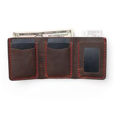 This Leather Trifold wallet makes a THUD when it lands on the table.The Heritage Brown Trifold is unlike any wallet you've ever seen. Perfect for long trips where you need access to deep pockets and a flip-out ID window. This wallet will look better the more you use it and is built for adventure. As Patina forms on the leather, your wallet will become a record of your time together.This full-grain leather wallet is designed to hold a lot of cards and a lot of cash. Easily flip out your ID when i Brown Trifold Wallet With Card Slots For Travel, Brown Trifold Wallet With Interior Card Slots For Travel, Trifold Wallet With Interior Card Slots For Travel, Trifold Card Holder With Coin Pocket For Travel, Travel Bifold Card Holder With Pockets, Leather Trifold Wallet With Pockets, Leather Trifold Wallet For Travel, Brown Trifold Wallet With Pockets, Travel Trifold Wallet With Coin Pocket