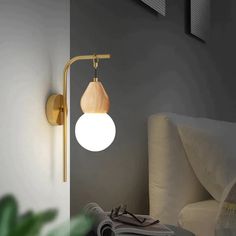 a lamp that is on the side of a wall