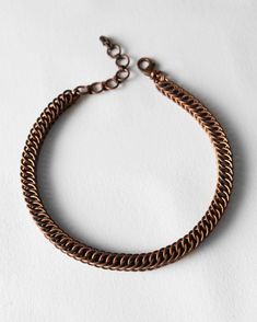 Commissions and customization are available for all my pieces. Whether you have a design in mind or a preferred metal. Feel free to reach out! This handmade copper chainmail necklace is a timeless piece of wearable art, crafted with care and precision. The intricate weave of the chainmail design gives this necklace a distinctive look that will turn heads wherever you go. Whether you're looking for a bold statement piece or a subtle accent to your outfit, this necklace is sure to make a lasting impression. ♦Handmade with Love: Each link is individually crafted by hand, ensuring a high-quality, unique design. ♦Copper Metal: Made from durable copper, this necklace features a warm, rustic finish that will naturally develop a patina over time, adding character and charm. ♦Custom Sizing: This ne Marketing Jewelry, Copper Chain Necklace, Chainmail Necklace, Woven Jewelry, Chainmail Jewelry, Unique Gifts For Men, Copper Necklace, Copper Chain, Chain Mail