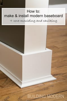 the bottom part of a white baseboard on a wooden floor