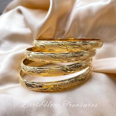 These bangles 18k gold filled cuff, stacking bangle are a perfect gift for a special women. Treat yourself or a loved one. These unique bangles will enhance any outfit. Size 2.5 inches (openable bangle) width of 5mm. ❤️Price for a pair (2 bangles) The bangles are made from a high quality 18k gold plated stainless steel- tarnish free!💖 🌸See our entire jewelry collection here: https://www.etsy.com/shop/LittlehoopTreasures Do you love this item and want to buy it later? Just click on the heart-sh Adjustable Stackable Gold-plated Bangle, Gold Hoop Cuff Bracelet Gift, Gold Hoop Cuff Bracelet As Gift, Gold Plated Stackable Cuff Bracelet For Gifts, Gold Plated Stackable Cuff Bracelet As A Gift, Stackable Gold Plated Bangle Bracelet, Stackable Gold Plated Cuff Bracelet As A Gift, Gold-plated Stackable Cuff Bracelet As Gift, Gold-plated Stackable Gold Bangle